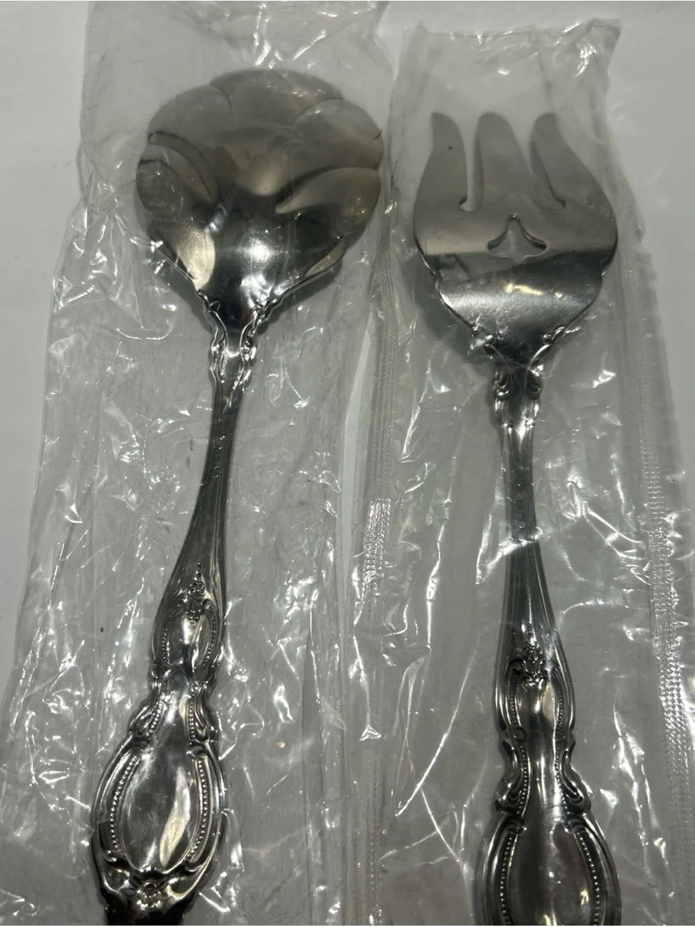 Oneida Silver Tone Decorative-Handle Serving Spoon and Fork Set